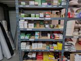 many boxes and packages on the shelves in the store