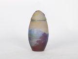 a small vase with a colorful design on it