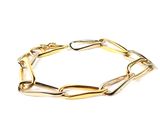 a close up of a gold chain bracelet on a white background