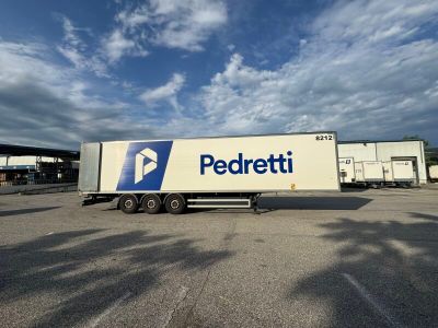 a semi truck that is parked in a parking lot