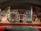 a close up of a car dashboard with various gauges