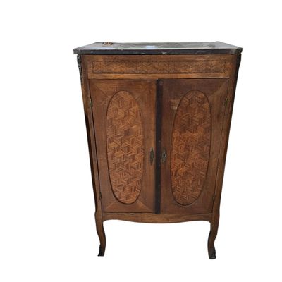 an image of a wooden cabinet with a marble top