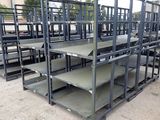 a lot of metal shelvings stacked on top of each other