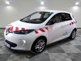 a picture of a small white car with red and white stripes