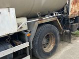 a truck that is parked on the side of the road