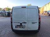 a white van parked on the side of the road