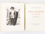 an open book with a drawing of a woman in a long dress