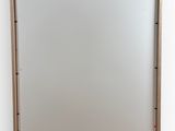 an image of a whiteboard with writing on it and a clipboard attached to it
