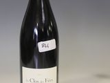 a bottle of wine that is sitting on a table