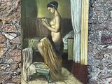 un tableau représentant une femme nue assise sur un lit