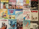 a lot of books that are on the floor together