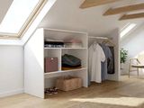 an image of a bedroom with a skylight and a closet