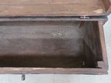 a wooden box that has a handle on it