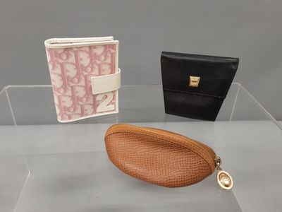 DIOR Christian. Ensemble de maroquineries comprenant : un po…