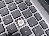 a close up of a computer keyboard with a micro chip