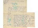 une lettre écrite à l'encre bleue sur une feuille de papier