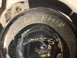 a close up view of a camera lens with writing on it