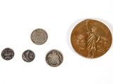 an image of a group of coins sitting on top of a white surface