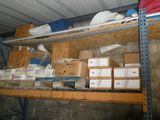 many boxes and boxes on the shelves in the garage
