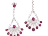 a pair of ruby and diamond earrings