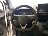 a steering wheel and dashboard of a car in a car showroom