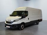 a white van that is parked in a room
