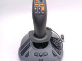 a remote control for a video game system on a table