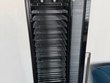 an image of a refrigerator with many trays of food inside of it