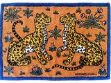 a painting of two leopards sitting on top of a rug