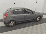 a picture of a small car parked in a garage