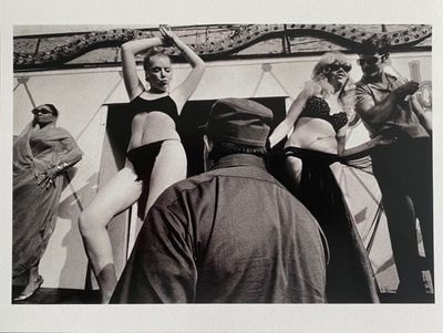 black and white photograph of a group of women in bathing suits on a boat