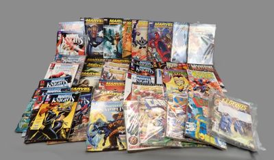 a lot of comic books sitting on a table