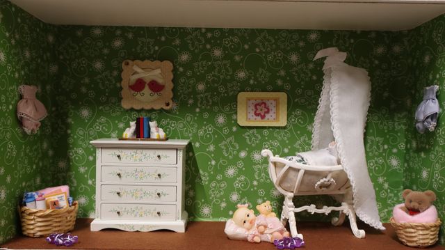 Diorama. Composition miniature, dans une vitrine en bois, vitre e...