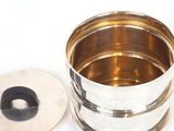 a silver container with a lid and a rubber ring