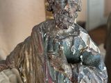 a statue of a man with a beard and a robe