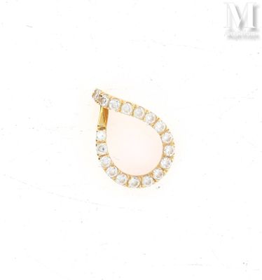 a close up of a diamond and gold earring on a white background