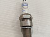 a close up of a spark spark on a white surface