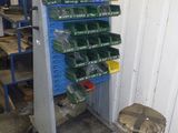 an image of a rack of plastic containers in a garage