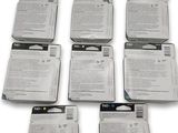 several pages of paper are stacked on top of each other