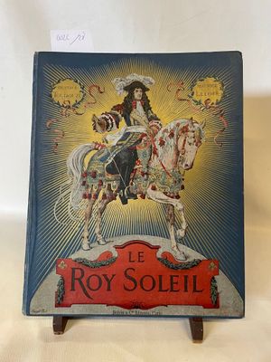 an old book with a picture of a woman riding a horse