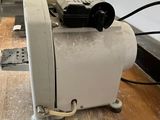 a machine that is sitting on a table in a room