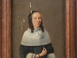 a painting of a woman holding a cat in a wooden frame
