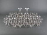 an image of a group of glass vases sitting on top of a table