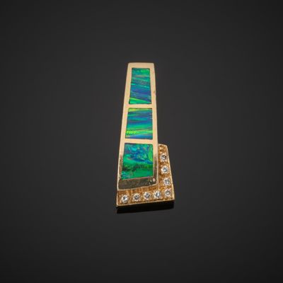 Pendentif en or jaune 585°°° (coquille) à motif géométrisé, …