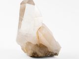 a close up of a rock with a white substance on it