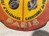 a yellow and red sign with a picture of a crown on it