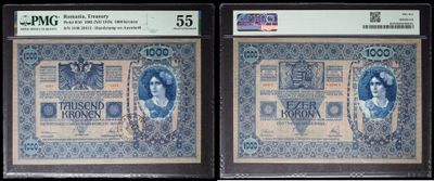 three different types of currency are on display in a display case