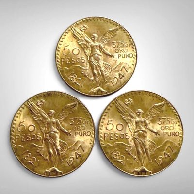 trois pièces d'or sur lesquelles figurent l'effigie d'un homme et d'une femme