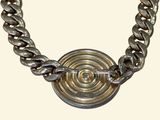 silver necklace with a circular clasp on a chain on a white background