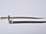 a pair of two swords are shown on a white surface